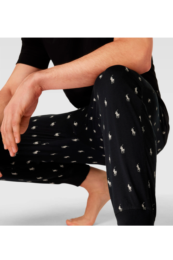 Pantalón de buzo con estampado negro
