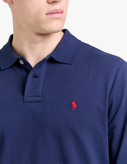 Polo de piqué manga larga corte slim azul marino