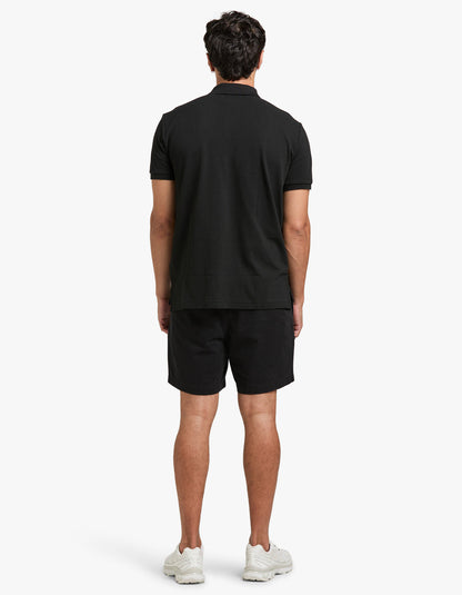 Polo de piqué manga corta corte slim negro