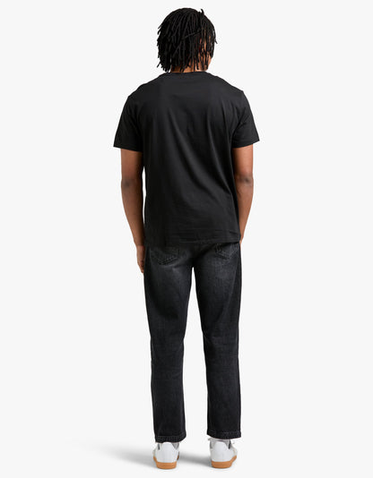 Polera cuello redondo corte slim negra