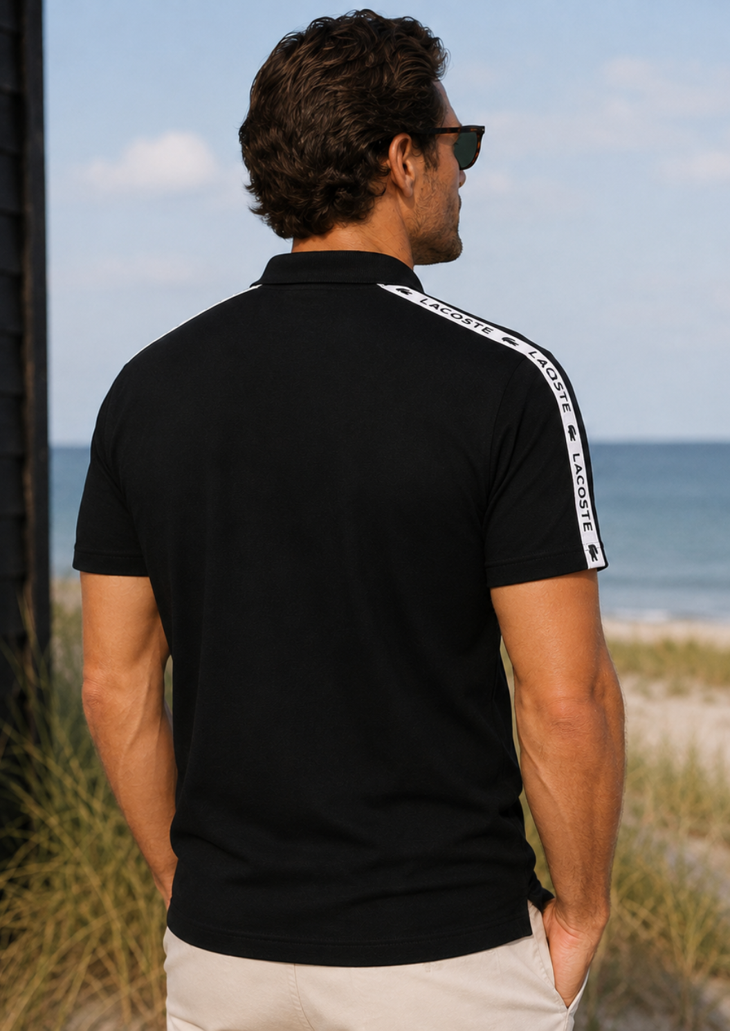 Polo deportivo con franja negro