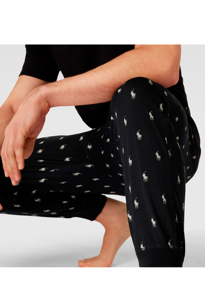 Pantalón de buzo con estampado negro